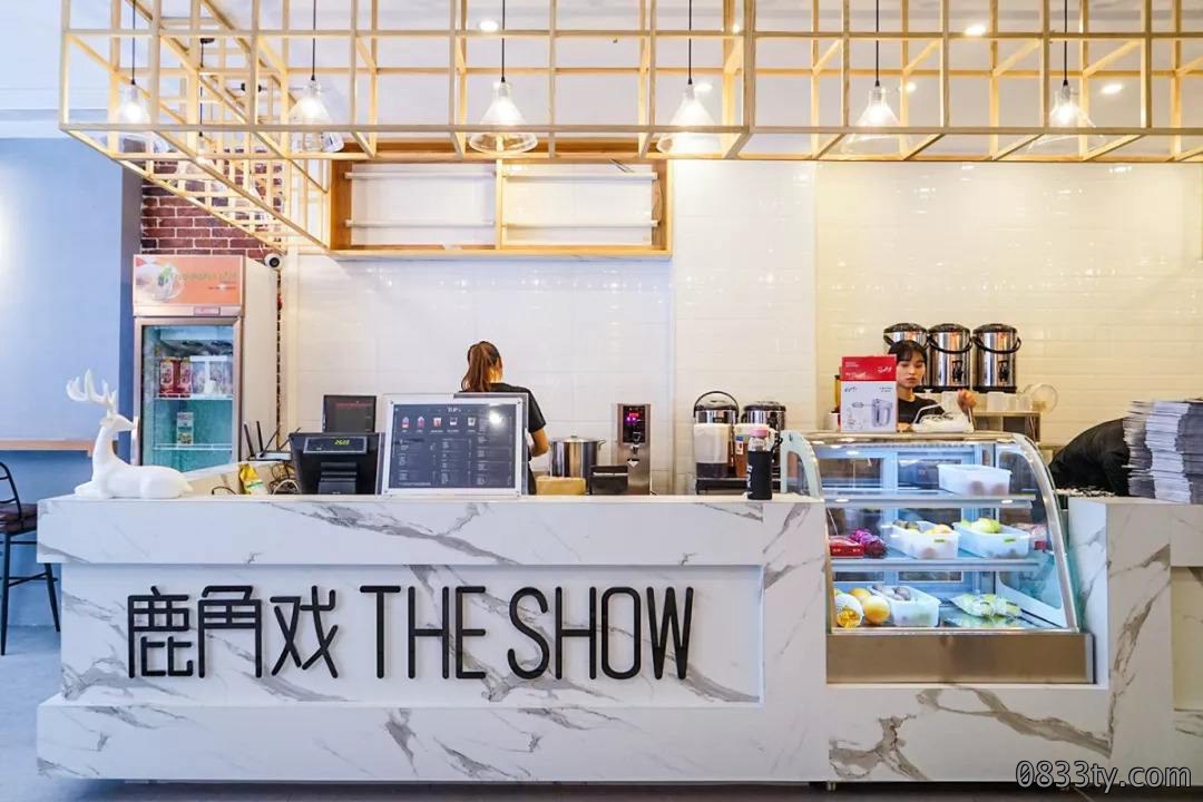 鹿角戏奶茶店前台装修图片
